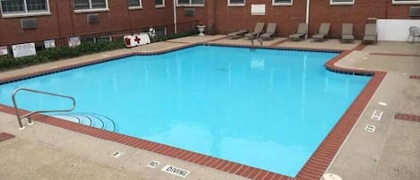 Soak up the sun near the outdoor pool in the warmer months, a rare find for downtown!