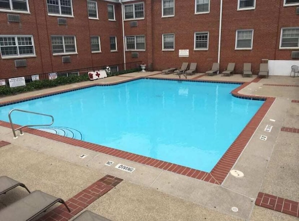 Soak up the sun near the outdoor pool in the warmer months, a rare find for downtown!