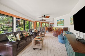 Living area with a queen sized Murphy Bed for extra guests.