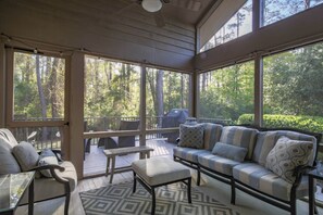Relax on the screened porch that connects to the dining area and back deck.
