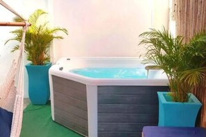 Chill by the Hammock or soak in the hot tub.