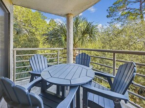 Main Balcony with Outdoor Dining Table at 2316 Villamare