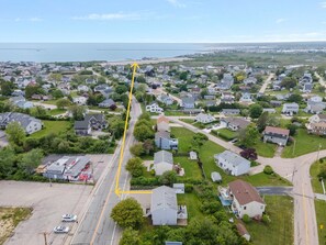 Just over 1/2 mile (.6 miles) to Roger Wheeler State Beach.