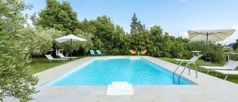 Water, Plant, Sky, Swimming Pool, Cloud, Shade, Outdoor Furniture, Rectangle, Building, Grass