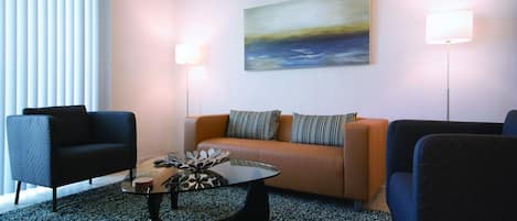 Furnished Living Room with Modern Interior Design - Corporate Apartments - 2-Bedroom Spectacular Suites