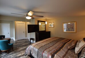 The master bedroom shows how the 50-inch tv swings out to view from the bed.