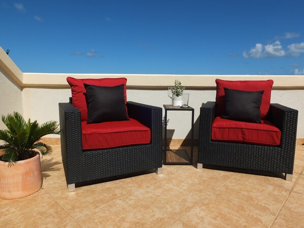 Enjoy a drink at sunrise or sunset on your veranda.