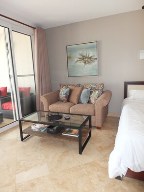 Love seat and coffee table in the Living Space.