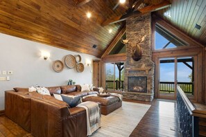 Great Room with Stacked Stone Gas Log Fireplace