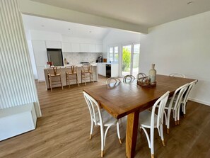 Dining table that extends to sit 8+ people