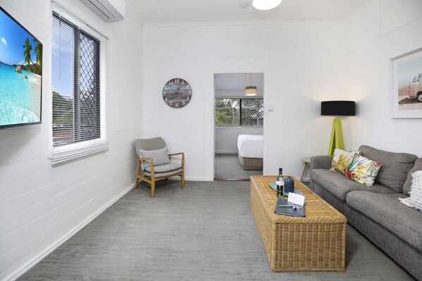 Living area with double-size sofa bed and Smart TV with complimentary Netflix and local channels