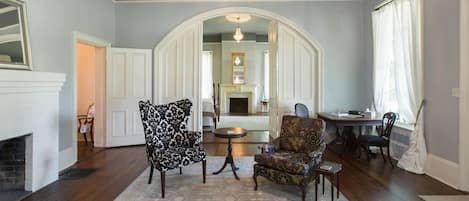 The front parlor opens into the front bedroom.