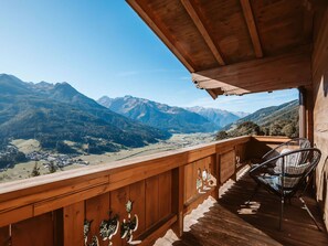 Sky, Mountain, Wood, Porch, Tree, House, Building, Wood Stain, Leisure, Landscape