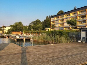 Sky, Water, Building, Plant, Window, Tree, Urban Design, Bank, Leisure, City