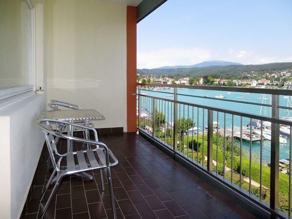 Water, Sky, Building, Property, Furniture, Plant, Table, Chair, Wood, Shade