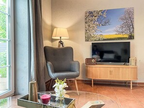 Furniture, Interior Design, Wood, Flooring, Living Room, Lighting, Home, Floor, Room, Chair