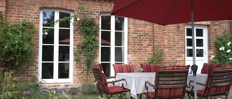 Plant, Flower, Building, Window, Furniture, Property, Chair, Flowerpot, Shade, House