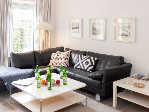 Furniture, Interior Design, Couch, Living Room, Flooring, Home, Table, Floor, Textile, Room