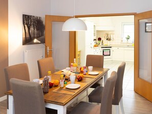 Furniture, Interior Design, Dining Room, Flooring, Chair, Table, Kitchen & Dining Room Table, Wood, Floor, Light Fixture