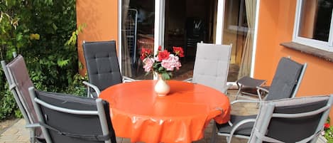 Plant, Furniture, Table, Property, Flower, Chair, Window, Flowerpot, Houseplant, Outdoor Table