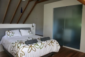 Loft double bed and en-suit glass doors.