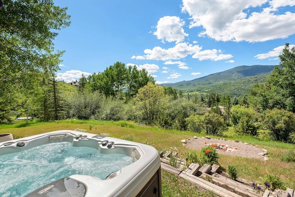 You will love the view from the beautiful private hot tub.