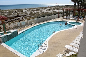 There are 2 pools and a spa. This is a view of the heated pool and spa.