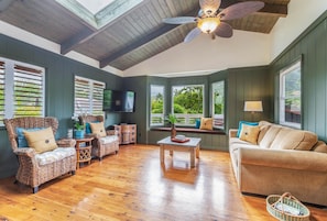 Bright and light! Comfortable seating in the living room area.