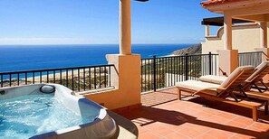 View from upper deck, spa and lounge chairs. 