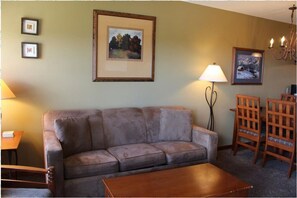 Living area and pull out couch. Blanket chest with all the covers AND a Snuggie!