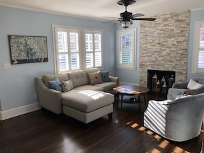 Front living room with ample seating and big screen Roku TV for easy operating. 