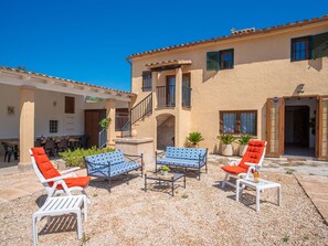 Sky, Plant, Building, Furniture, Window, Azure, Chair, Shade, Outdoor Furniture, Interior Design