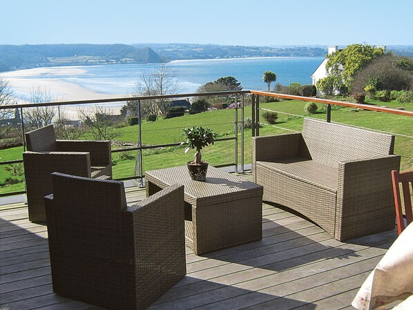 Sky, Water, Plant, Property, Building, Table, Shade, Outdoor Furniture, Tree, Urban Design