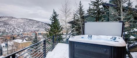 Perched on Lowell Avenue, the Lowell House has incredible views of Park City. Relax in your private hot tub after a day on the mountain and take it all in!