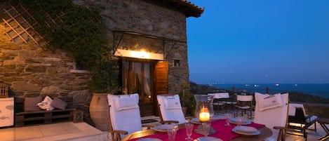 The front of the villa faces the sea but there are views to the hills