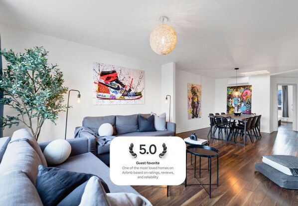 Living Room: Features 2 queen-size sofa beds, 1 queen air mattress, and a Smart HD TV. Log in to your favorite streaming services like Netflix, YouTube, and Prime Video.