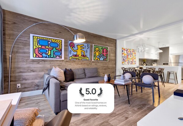 Living Room: Features queen-size sofa beds with Art Deco, and a Smart HD TV with Netflix, YouTube, and Prime.