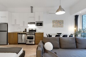 Fully equipped kitchen, complete with complimentary coffee and tea.