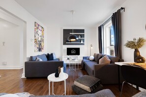 Living Room: Features 3 sofa beds and a Smart HD TV. Log in to your favorite streaming services like Netflix, Disney+, and Prime.