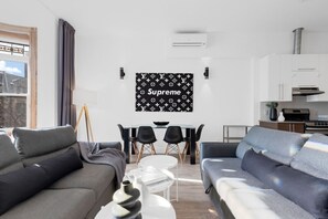 Living Room: Features 2 sofa beds + little table and a Smart HD TV. Log in to your favorite streaming services like Netflix, Disney+, and Prime.
