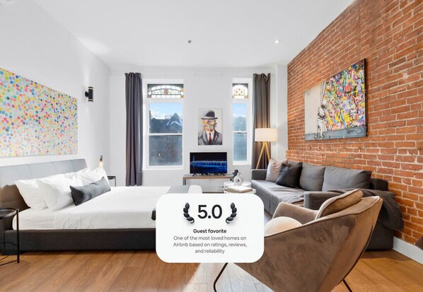 Living Room: Features 1 sofa bed, 1 queen-size bed with memory foam, Smart HD TV with Netflix, YouTube, and Prime.