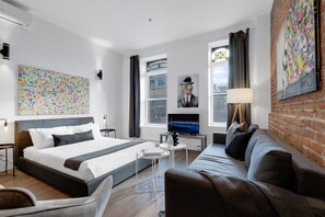 Living Room: Features 1 sofa bed, 1 queen-size bed with memory foam, Smart HD TV with Netflix, YouTube, and Prime.