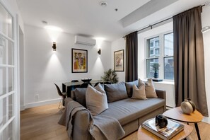 Living Room: Features 1 sofa beds and a Smart HD TV. Log in to your favorite streaming services like Netflix, Disney+, and Prime.