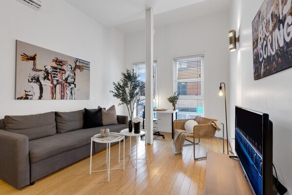 Living Room: Features 1 sofa beds and a Smart HD TV. Log in to your favorite streaming services like Netflix, Disney+, and Prime.