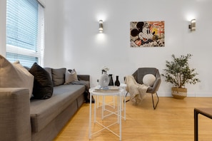 Living Room: Features 1 sofa beds and a Smart HD TV. Log in to your favorite streaming services like Netflix, Disney+, and Prime.