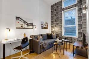 Living Room: Features 1 sofa beds and a Smart HD TV. Log in to your favorite streaming services like Netflix, Disney+, and Prime.