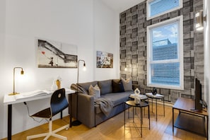 Living Room: Features 1 sofa beds and a Smart HD TV. Log in to your favorite streaming services like Netflix, Disney+, and Prime.
