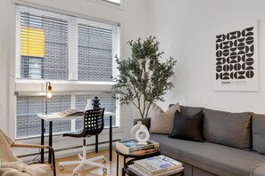 Living Room: Features 1 sofa beds and a Smart HD TV. Log in to your favorite streaming services like Netflix, Disney+, and Prime.