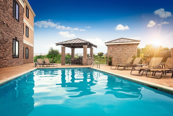 Take in gorgeous views while lounging around the on-site outdoor pool.