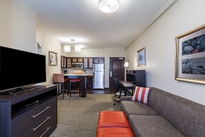 Sink into the cozy sofa after a day exploring the area.
